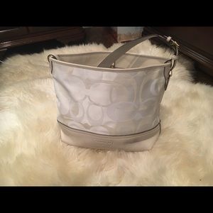 Pristine never used white coach bucket bag
